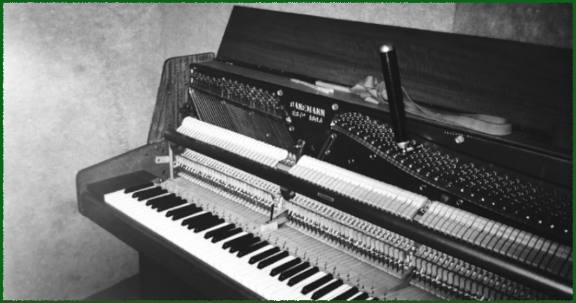 The action and keyboard of an upright piano